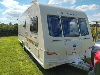 2011 BAILEY UNICORN VALENCIA 4 BERTH FIXED BED TOURING CARAVAN WITH MOTOR MOVER