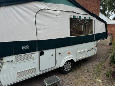 Conway Crusader 2006 folding camper with side skirts & full Isabella awning