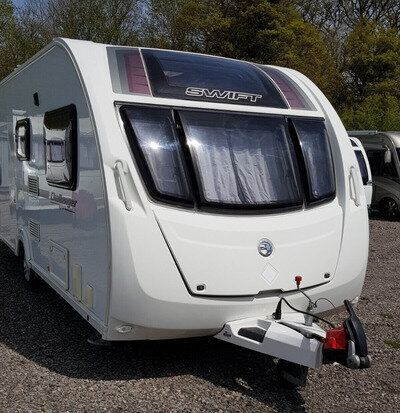 SOLD ****2012 Swift Challenger Sport 585, 6 birth with motor mover