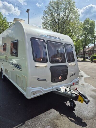 bailey caravan fixed island bed with motor mover and dorema awning take away to