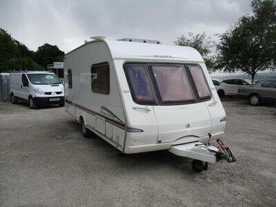 2006 Swift Charisma 540 5-Berth Caravan. Rear dinette / bunks.