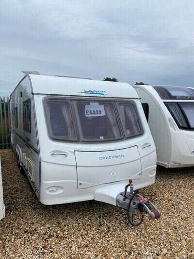 Coachman. LASER. 590/4. £6995. Twin axel