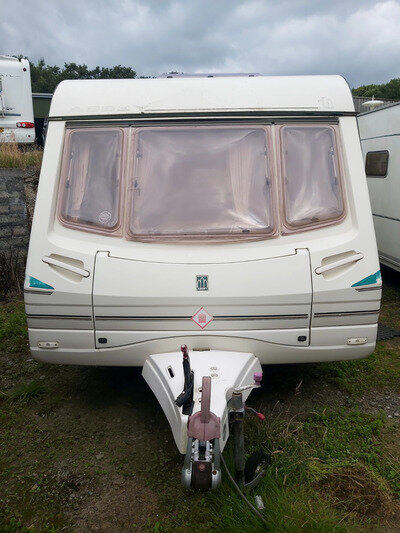 tourer caravan fixed bed