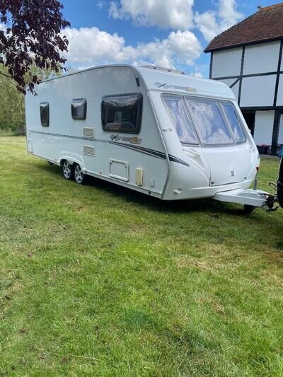 twin axle caravan fixed bed with blow up awning and annex bedroom