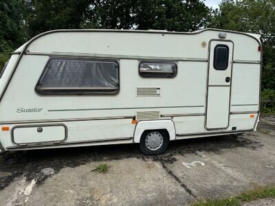 Sunstar 4 birth caravan DAMP & not sure what works