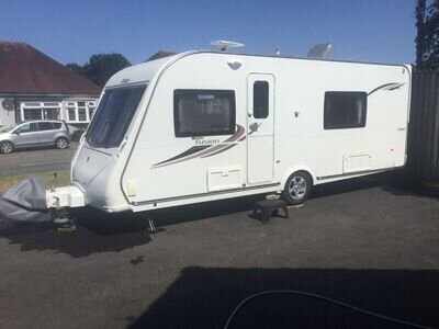 used 4 berth fixed bed touring caravan