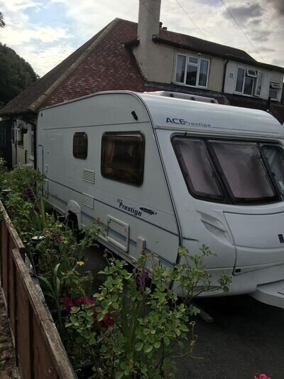 6 berth touring caravan fixed bed