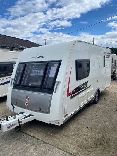 At. T Giles caravans RH13 ORE.