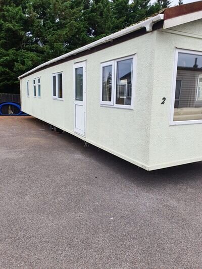 ROUGH CAST MOBILE HOME 44ft x 10ft 2 BEDROOMS