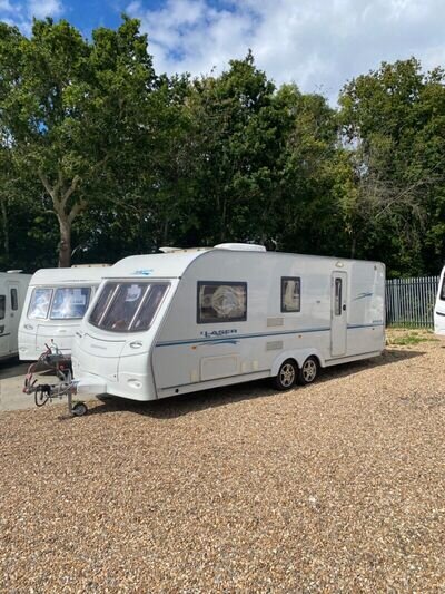 Coachman. LASER. 590/4. £7495. Twin axel