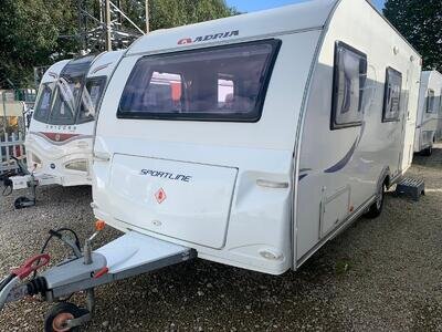 ADRIA SPORTLINE DT - 6 BERTH CARAVAN WITH FIXED TRIPLE BUNK BEDS + MOTORMOVER