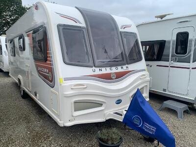 BAILEY UNICORN VIGO - FIXED ISLAND BED CARAVAN WITH END WASHROOM + MOTORMOVER