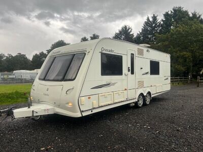 Elddis crusader supercyclone twin axle with dual motor movers, fixed beds