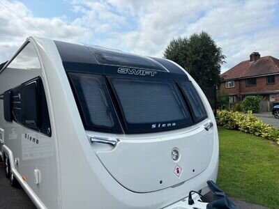 touring caravans for sale fixed bed