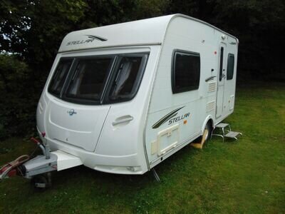 LUNAR STELLA 2010 STUNNING TWO BERTH CARAVAN WITH MOTOR MOVER AND PORCH AWNING