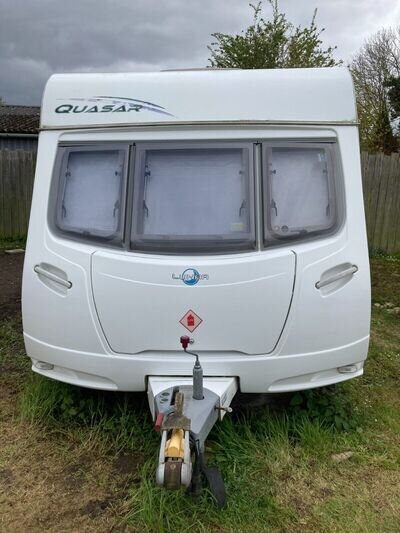 Touring caravans for sale fixed bed