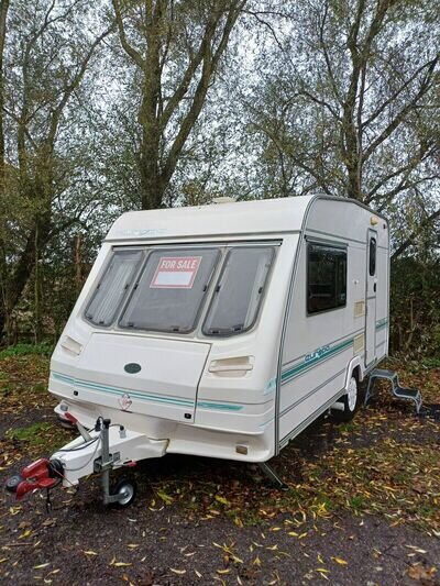 END KITCHEN 2 BERTH, STERLING EUROPA TOURING CARAVAN. MOTOR MOVER. ALL WORKS!