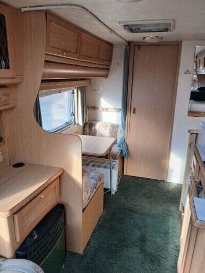 lunar 2002 4 berth, no damp, end shower ensuite,cris reg,awning,lots of extras,