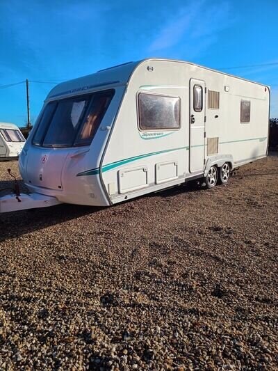 Abbey Spectrum 540 Twin axle touring caravan fixed bed four berth good condition