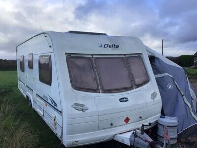 Lunar Delta 640 EW Twin Axle Fixed Bed Caravan 2004 including Blow Up Awning