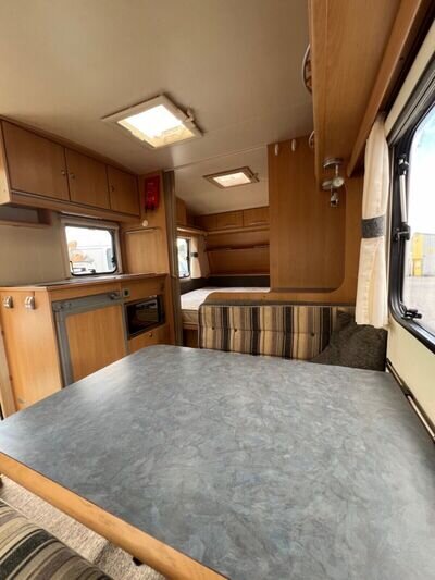 Adria 4 berth touring caravan with fixed bed and powermover