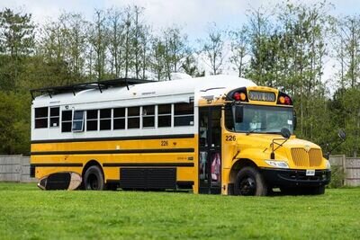 American school bus conversion, off grid motorhome, glamping bus.