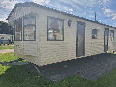 CHEAP STARTER CARAVAN FOR SALE BY THE SEA IN TOWYN FREE SITE FEES, not haven not