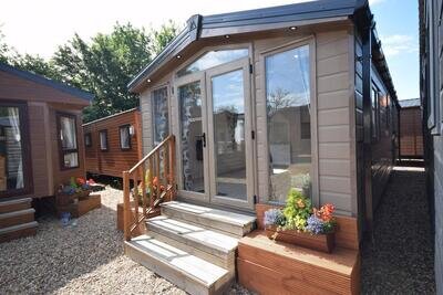 NEW Sunrise Micro Lodge | 33x12 with 2 beds | 100mm insulation | off site